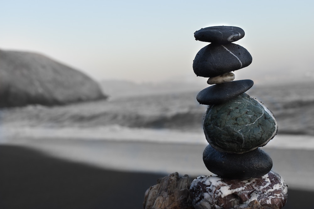 Balance art - photo of a cairn or stack of rocks on a beach